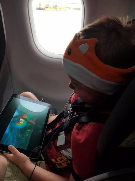 A child wearing CozyPhones