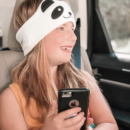 A child wearing CozyPhones