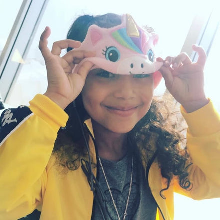 A child wearing CozyPhones