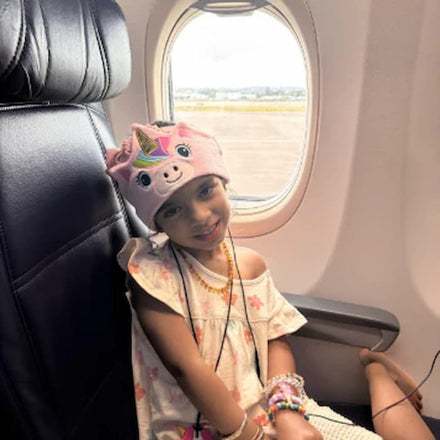 A child wearing CozyPhones